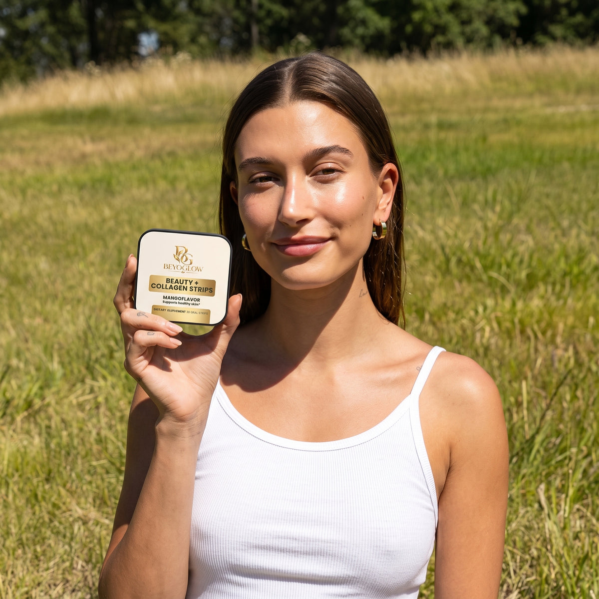BEYOGLOW Vitamin Glow Serum, Anti Aging Moisturizer and Beauty + Collagen Strips arranged on a cream surface